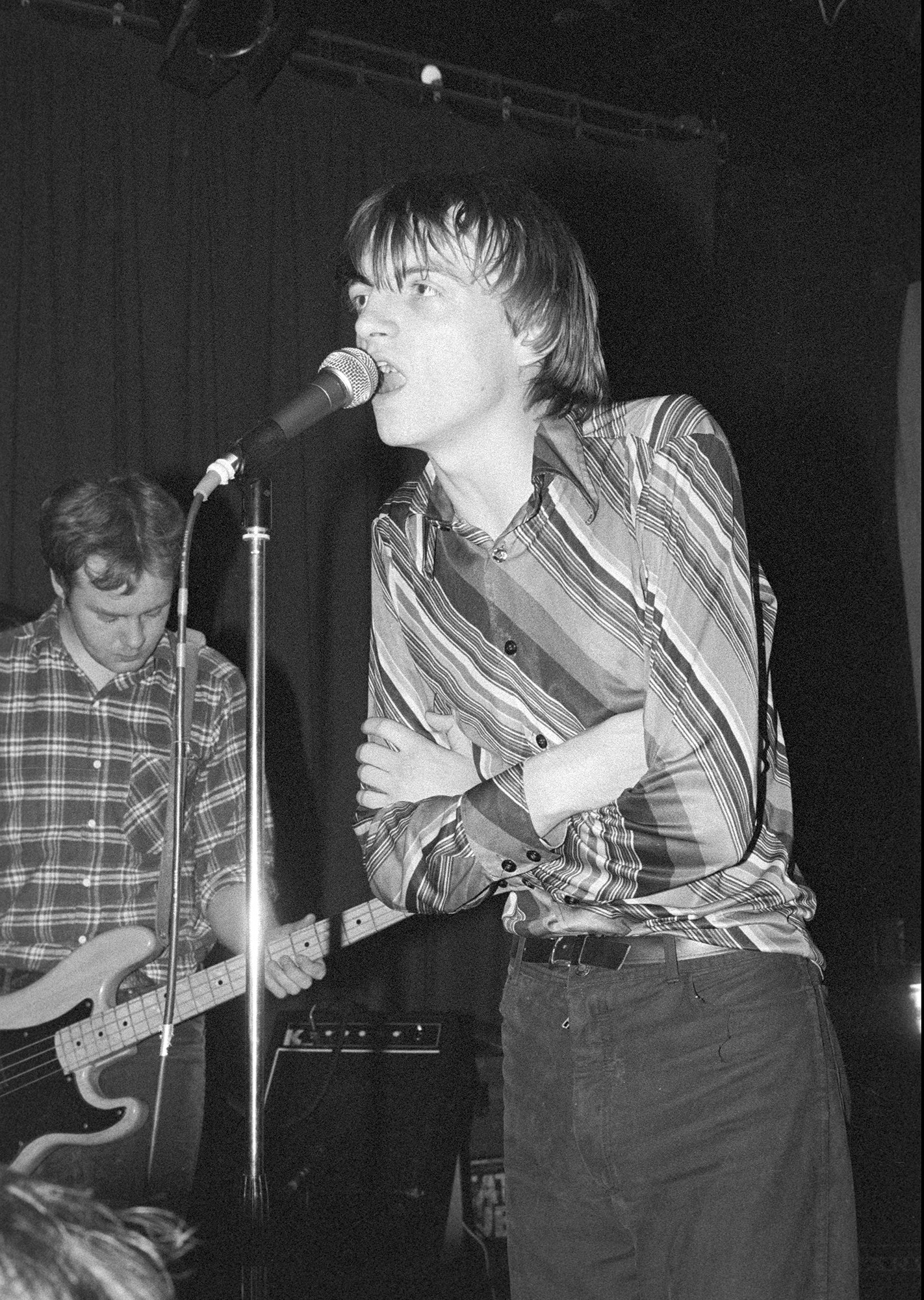 The Fall’s front man Mark E. Smith, with Steve Hanley on bass, at the ICA in London, June 18, 1980. Photo by David Corio/Redferns.